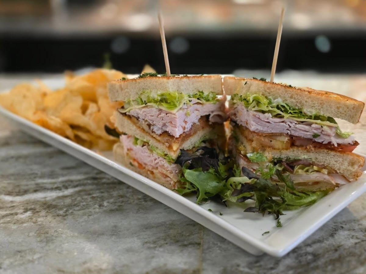 Stacked sandwich with house chips at Twysted Vyne, Inverness FL